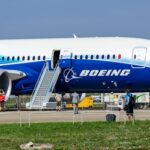 Cockpit Charge Triggers Level 4 PANIC… Boeing 787 airplane at an airport with passengers boarding