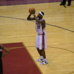 Basketball player 23 preparing to shoot free throw.