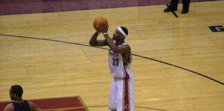 Basketball player 23 preparing to shoot free throw.