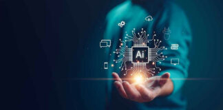 Person holding AI technology symbols in hand.