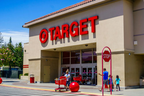 Entrance of a Target store with shoppers and shopping carts