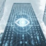 Beijing Fury As Pentagon Flagged Big Tech Futuristic digital overlay on a skyscraper with an eye symbol