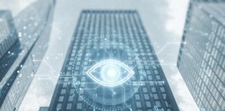 Futuristic digital overlay on a skyscraper with an eye symbol
