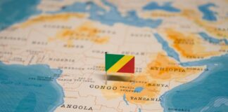 Small Republic of the Congo flag pinned on a map of Africa