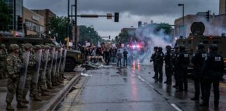 A tense standoff between law enforcement and protesters during a demonstration