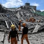 Twin Quakes DEVASTATE Venezuela Rescue workers survey collapsed building debris