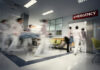 Medical staff rushing patient on stretcher in emergency room.