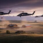 Black Hawks Blitz Camp—What Forced 202 Airlifts Military helicopters fly low over a rural farm at sunset