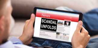Person reading news website on tablet