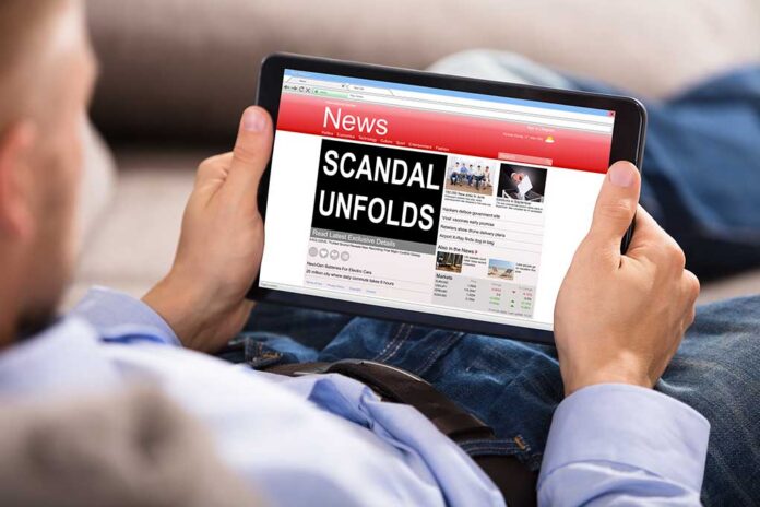 Close-up,Of,A,Man,Reading,Unfolds,Scandal,News,On,Digital Person reading news website on tablet