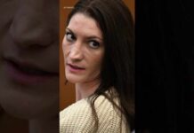 Women in pink rally in support of Lindsay Clancy who is on trial for killing 3 children