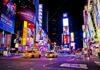 Police Gunfire Ends Times Square Horror Times Square at night with bright billboards and yellow taxis