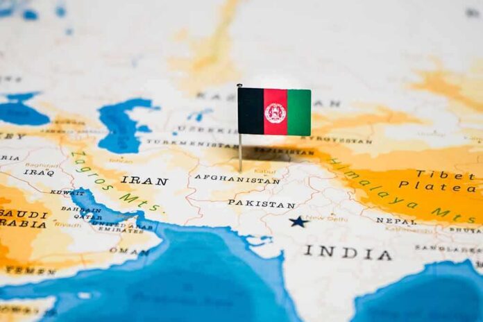 Afghanistan flag pin on a map of South Asia