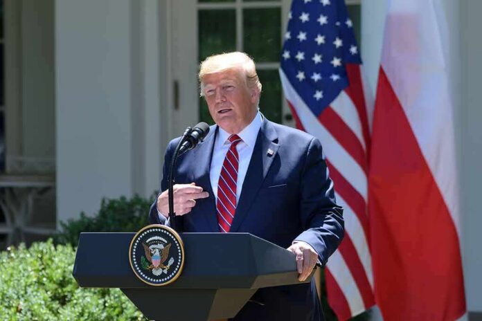 man at presidential podium speaking outdoors