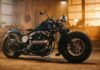Custom vintage motorcycle in a dim workshop