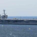 Aircraft carrier sailing at sea