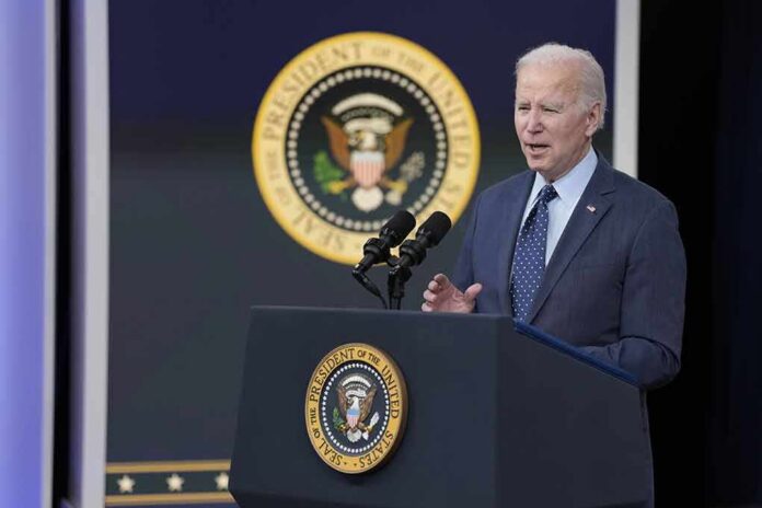 shutterstock_2266516933 man in suit speaking at presidential podium
