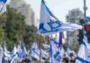 Israeli flags waved at a street demonstration