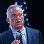 Robert F. Kennedy Jr. speaking into a microphone