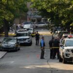 Fentanyl Car Storms Camp Pendleton Police officers secure a residential street with patrol cars and yellow tape