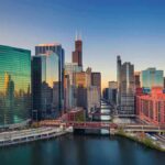 Chicago skyline along the river at sunset