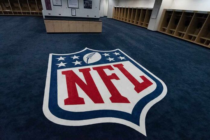 shutterstock_1163596087 NFL logo on the floor of an empty locker room
