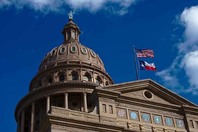 Texas State Capitol dome with U.S. and Texas flags