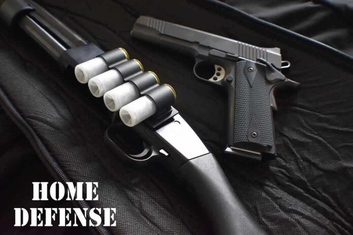 Shotgun and handgun on a black case