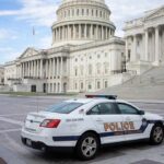 Police car parked outside the United States Capitol building