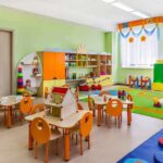 Preschool classroom with colorful furniture and toys