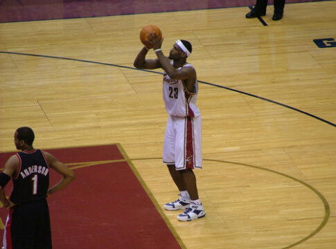 Basketball player 23 preparing to shoot free throw.