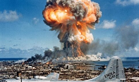 A nuclear explosion with a military aircraft in the foreground